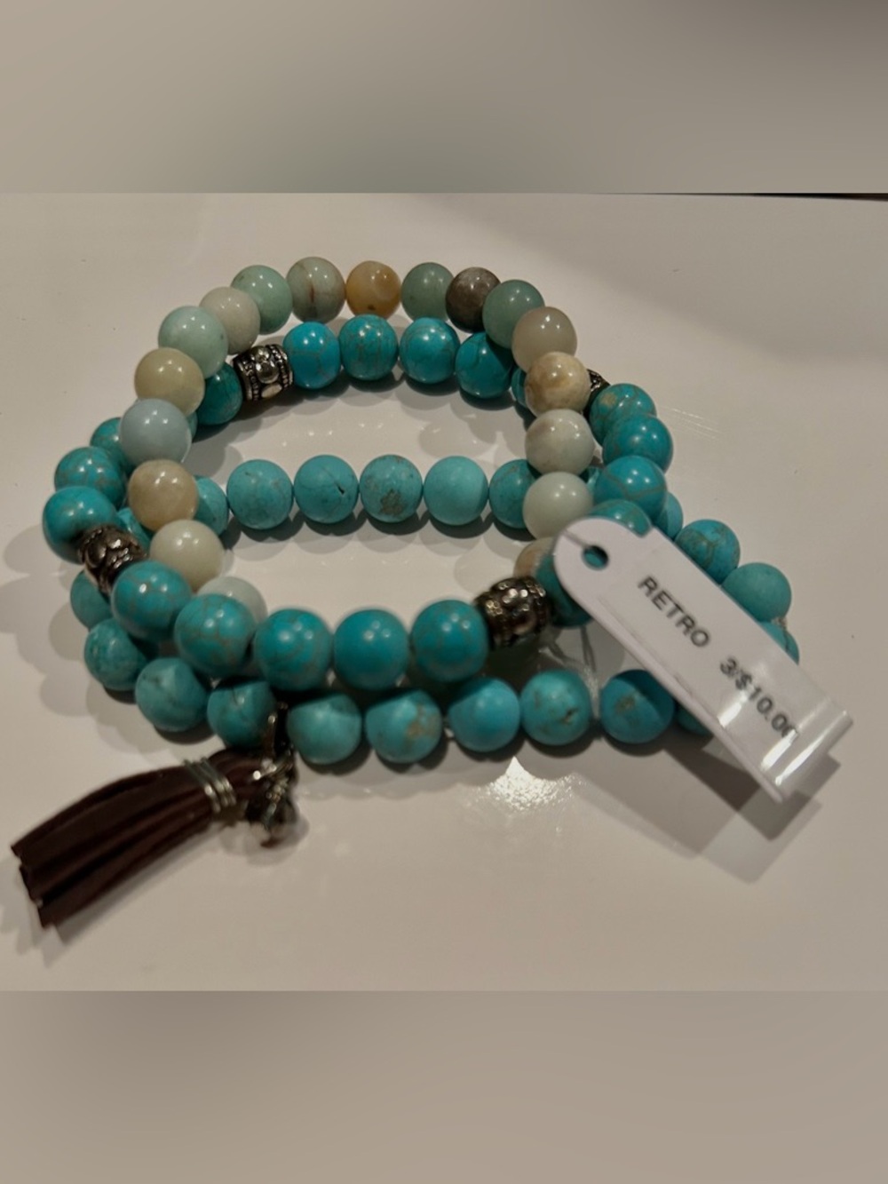 SOLD**RetroTurquoise and Cream Beaded Stretch Bracelets with Brown Tassel